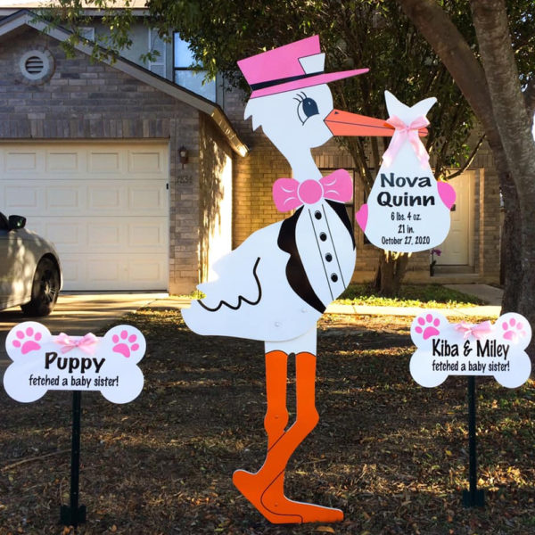 Pink Stork Sign with Dog Bone Sign : Stork Rental Yard Signs in Storks of South County, Southern California